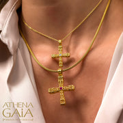 woman wearing two 18k gold orthodox crosses from Greece