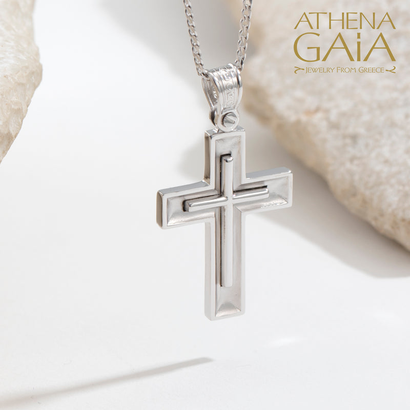 white gold Latin Baptism cross hanging on gold chain