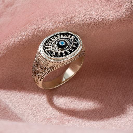 Decorative evil eye ring with intricate design