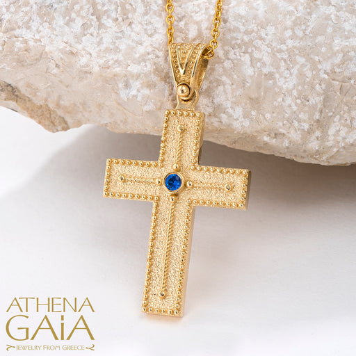 yellow gold beaded edge Orthodox Baptism cross with blue stone center