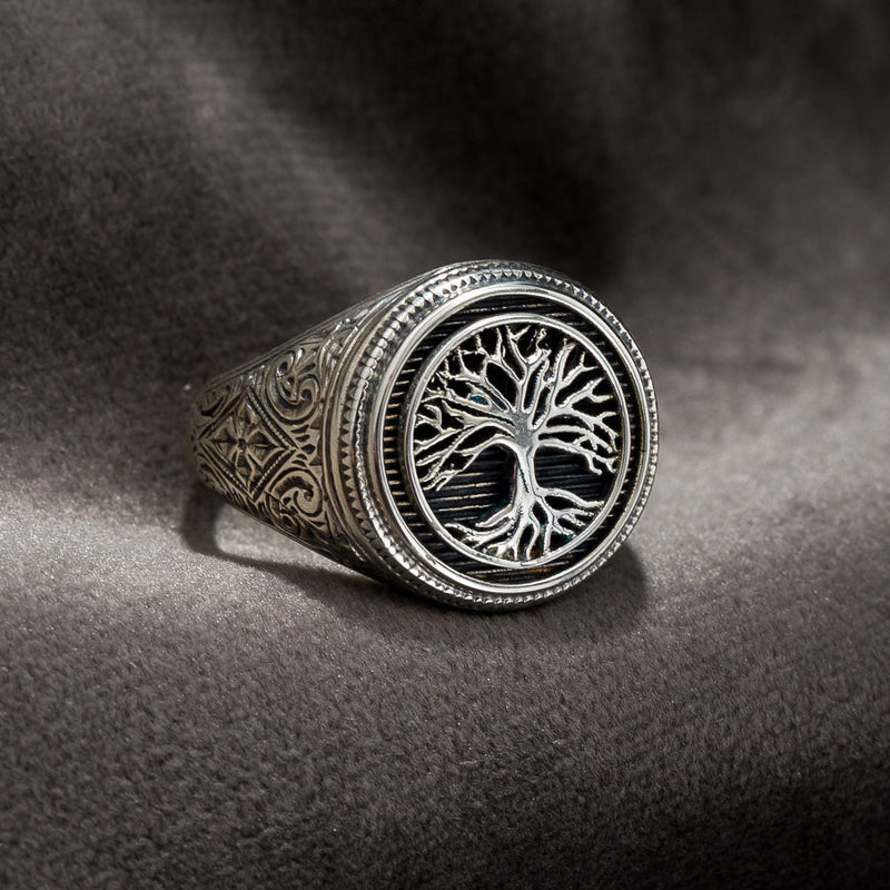 Silver ring with tree of life design