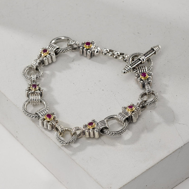 Silver bracelet with gemstone accents