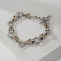 Silver bracelet with gemstone accents