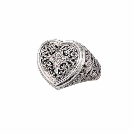 Silver heart-shaped ring with intricate designs