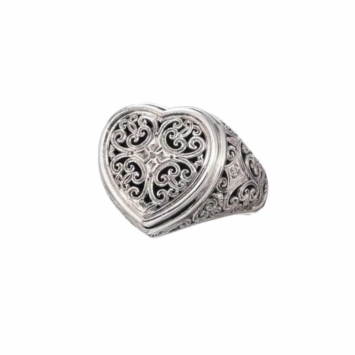 Silver heart-shaped ring with intricate designs