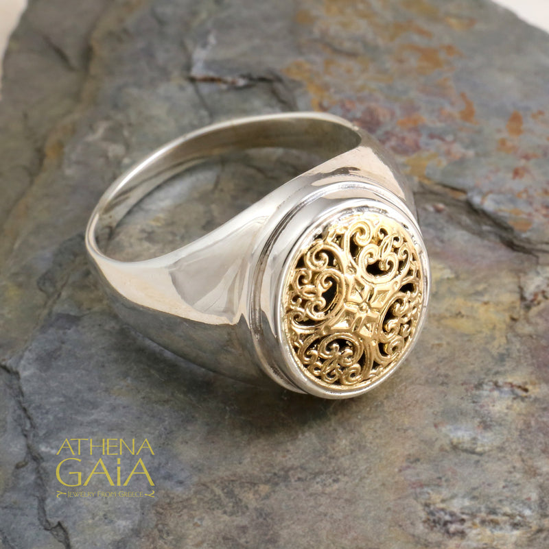 A refined blend of 18k gold and sterling silver detail, bringing scrollwork and classic Greek artistry.