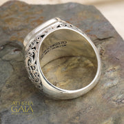 Men’s silver ring with ornate filigree sides and gold scrollwork face, handcrafted Greek design.