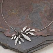 silver necklace in leaf shapes with pearls