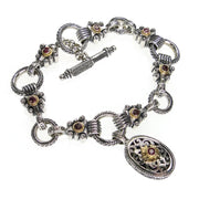 silver and 18k gold charm bracelet